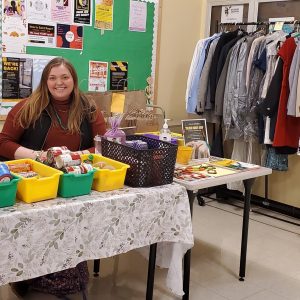 Saint Rose student Sarah Sharkey staffs the Golden Knight Shop